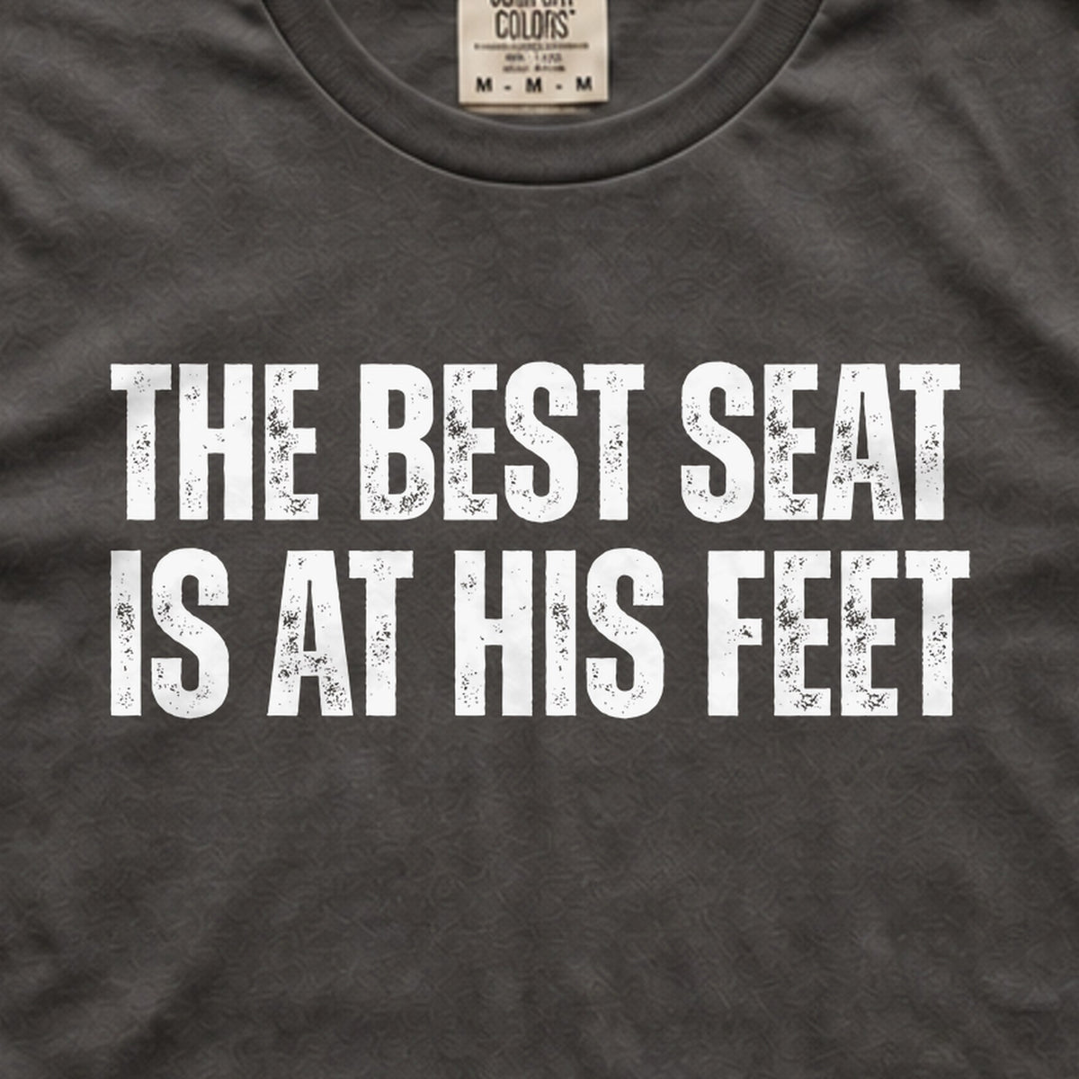 The Best Seat Is at His Feet tee print close-up