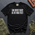 The Best Seat Is at His Feet Comfort Colors 1717 tee in Black