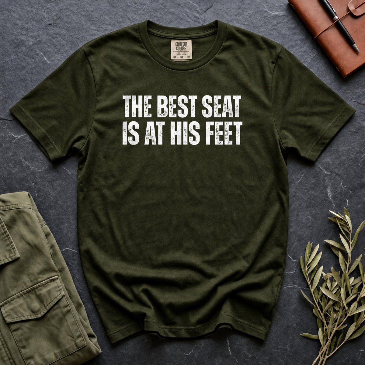 The Best Seat Is at His Feet Comfort Colors 1717 tee in Moss